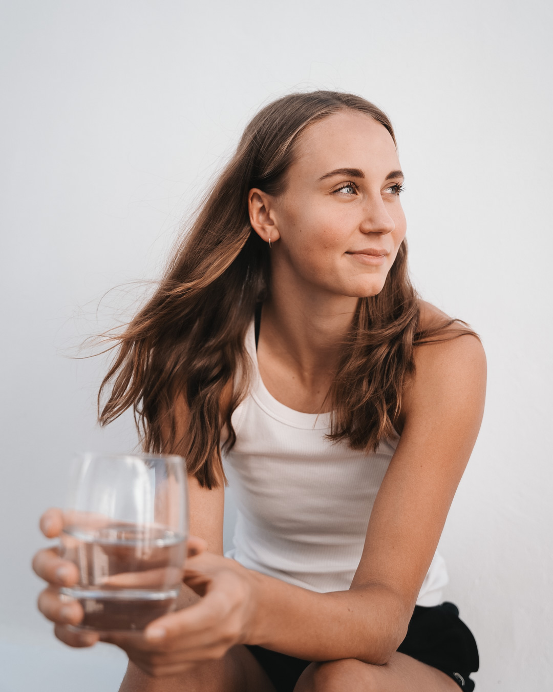 Portrait of Viivi Lehikoinen wearing a white top